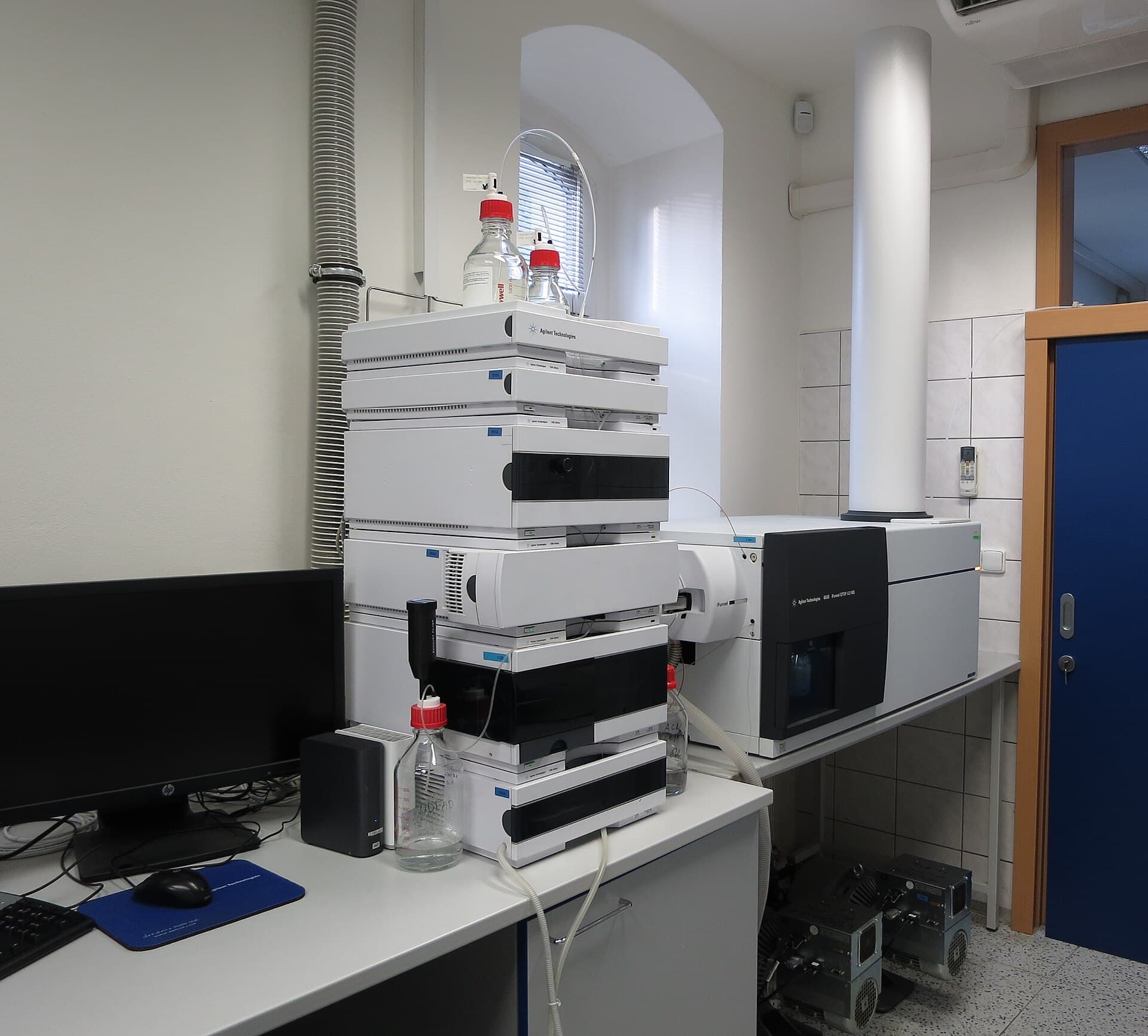 Liquid chromatograph coupled to a mass spectrometer on a laboratory bench